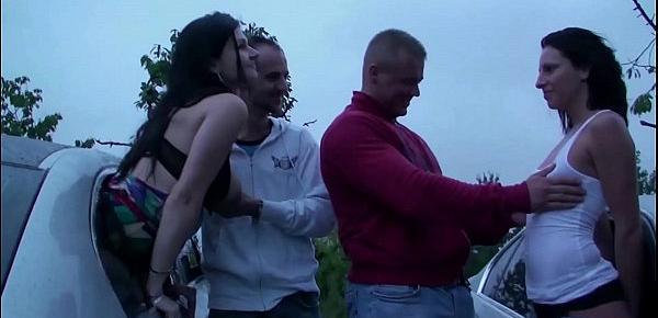  A girl is undressing on the way to a public sex gang bang dogging orgy